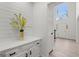 Bright entryway with white shiplap feature wall and view of foyer at 4267 Arbor Club Dr, Marietta, GA 30066