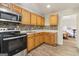 Updated kitchen with stainless steel appliances, ample cabinetry, and stylish backsplash at 1144 Kipling Se St, Atlanta, GA 30315