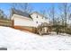 Home with a deck and backyard, snow on the ground at 380 River Point Dr, Mcdonough, GA 30252