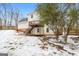 Home with a deck and backyard, snow on the ground at 380 River Point Dr, Mcdonough, GA 30252