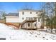 Home with a deck and backyard, snow on the ground at 380 River Point Dr, Mcdonough, GA 30252