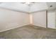 Spacious bedroom with high ceilings and carpet at 380 River Point Dr, Mcdonough, GA 30252
