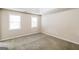 Bright bedroom with neutral walls and carpet at 380 River Point Dr, Mcdonough, GA 30252