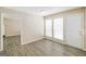 Dining area with hardwood floors and access to backyard at 380 River Point Dr, Mcdonough, GA 30252
