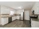 Kitchen with granite countertops, white cabinets, and stainless steel appliances at 380 River Point Dr, Mcdonough, GA 30252