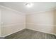 Spare bedroom with hardwood floors and neutral walls at 380 River Point Dr, Mcdonough, GA 30252