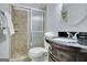 Clean bathroom with shower, toilet and granite vanity at 1102 Hip Pocket Rd, Peachtree City, GA 30269