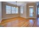 Bright dining room with hardwood floors and access to a deck at 45 Kinloch Ct, Covington, GA 30014