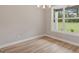 Inviting dining area with a large window offering plenty of natural light at 123 Oak Road, Locust Grove, GA 30248
