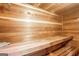 Relaxing cedar wood sauna with built-in bench seating at 409 Angier Ne Ct, Atlanta, GA 30312