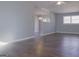 Spacious living room with hardwood floors and neutral walls, offering an open feel at 2500 Celina Ct, Morrow, GA 30260