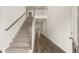 Bright entryway with hardwood floors and a staircase leading to the upper level at 13232 Tolstoy Drive, Covington, GA 30014