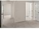 Spacious hallway with access to bedrooms and bathroom at 13232 Tolstoy Drive, Covington, GA 30014