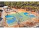Community basketball court surrounded by trees at 37 Highcrest Dr, Acworth, GA 30101