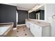 Bathroom features a long vanity with double sinks and a soaking tub at 37 Highcrest Dr, Acworth, GA 30101