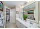 Bathroom featuring a double vanity, a large mirror, and tile floors at 37 Highcrest Dr, Acworth, GA 30101
