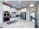 Bright kitchen with stainless appliances, an island with light countertops and white cabinets at 37 Highcrest Dr, Acworth, GA 30101