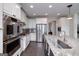Contemporary kitchen with stainless steel appliances, white cabinets and an island at 37 Highcrest Dr, Acworth, GA 30101