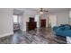 Living room featuring a couch, a TV, hardwood floors, and natural light at 37 Highcrest Dr, Acworth, GA 30101