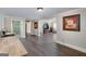 The open floor plan shows wood flooring and views of multiple rooms at 37 Highcrest Dr, Acworth, GA 30101