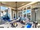 Cozy covered patio with outdoor furniture, fire pit, and outdoor lighting at 37 Highcrest Dr, Acworth, GA 30101