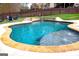 Gorgeous pool with a waterfall feature, perfect for relaxing and enjoying the outdoors at 37 Highcrest Dr, Acworth, GA 30101