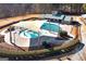 Aerial view of the community splash pad and kiddie pool with playground nearby at 37 Highcrest Dr, Acworth, GA 30101