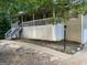 A house featuring a nice-sized porch with white railings and stairs leading to the front door at 3746 Chapel Hill Road, Douglasville, GA 30135