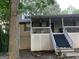 A house featuring a nice-sized front porch with white railings and stairs leading to the front door at 3746 Chapel Hill Road, Douglasville, GA 30135