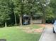 A house featuring a nice-sized front porch with white railings and stairs leading to the front door at 3746 Chapel Hill Road, Douglasville, GA 30135