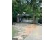A house featuring a nice-sized front porch with white railings and stairs leading to the front door at 3746 Chapel Hill Road, Douglasville, GA 30135