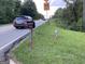 A view of a street, mailbox, and grassy area with fire hydrant on the side of the road at 3746 Chapel Hill Road, Douglasville, GA 30135