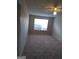 Bright bedroom with ceiling fan and carpet flooring at 3590 Stephens Creek Pl, Loganville, GA 30052