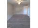 Large bedroom with ceiling fan and carpet flooring at 3590 Stephens Creek Pl, Loganville, GA 30052