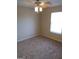 Spacious bedroom with ceiling fan and neutral decor at 3590 Stephens Creek Pl, Loganville, GA 30052