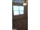 Bedroom with window, ceiling fan, and neutral carpet at 3590 Stephens Creek Pl, Loganville, GA 30052