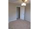 Bedroom with ceiling fan, closet, and neutral carpet at 3590 Stephens Creek Pl, Loganville, GA 30052