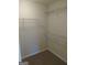 Spacious walk-in closet with wire shelving at 3590 Stephens Creek Pl, Loganville, GA 30052