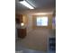 Bright dining area with wood cabinets and flooring at 3590 Stephens Creek Pl, Loganville, GA 30052