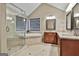 Elegant bathroom featuring a soaking tub and double vanity at 1312 Yarborough Dr, Peachtree City, GA 30269