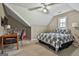 Comfortable bedroom with a queen bed and desk area at 1312 Yarborough Dr, Peachtree City, GA 30269