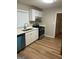 Functional kitchen boasts stainless steel appliances, white cabinets, and modern countertops at 752 Jefferson Sw Ave, Atlanta, GA 30315