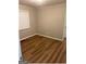 Cozy bedroom featuring wood-look flooring and a window for natural light at 752 Jefferson Sw Ave, Atlanta, GA 30315