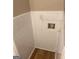 Tiled laundry space perfect for added storage and accessibility to plumbing at 752 Jefferson Sw Ave, Atlanta, GA 30315