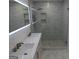 Modern bathroom with double vanity and large shower at 553 Highway 279, Fayetteville, GA 30214