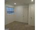Bright bedroom with carpet and neutral walls at 553 Highway 279, Fayetteville, GA 30214