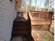 Wooden deck with stairs leading to the ground at 553 Highway 279, Fayetteville, GA 30214