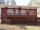 Spacious wooden deck with lattice work underneath at 553 Highway 279, Fayetteville, GA 30214