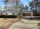 Ranch style home with carport and landscaped yard at 553 Highway 279, Fayetteville, GA 30214
