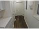 Bright hallway with light brown vinyl flooring at 553 Highway 279, Fayetteville, GA 30214